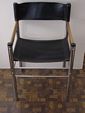 Mid Century Modern chrome and black naugahyde chair view 2